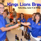 Kings Lions members President Ray Etchegoin and Gina Arcino share a brew.